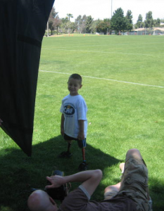 Tim Mantoani photographing a young CAF athlete.