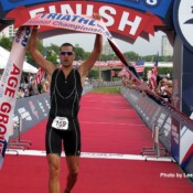 Adam Webber wins the 30-34 age division with a time of 1:54:21